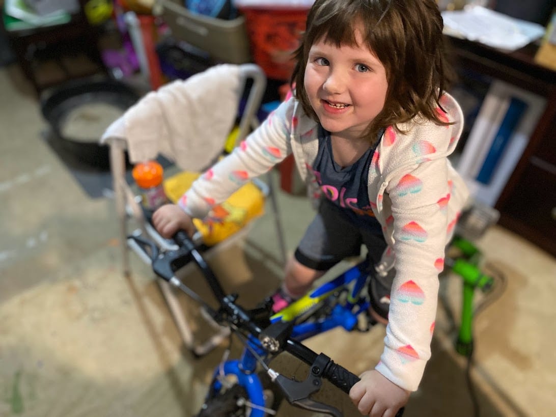 Zwift for Children young girl on indoor bike