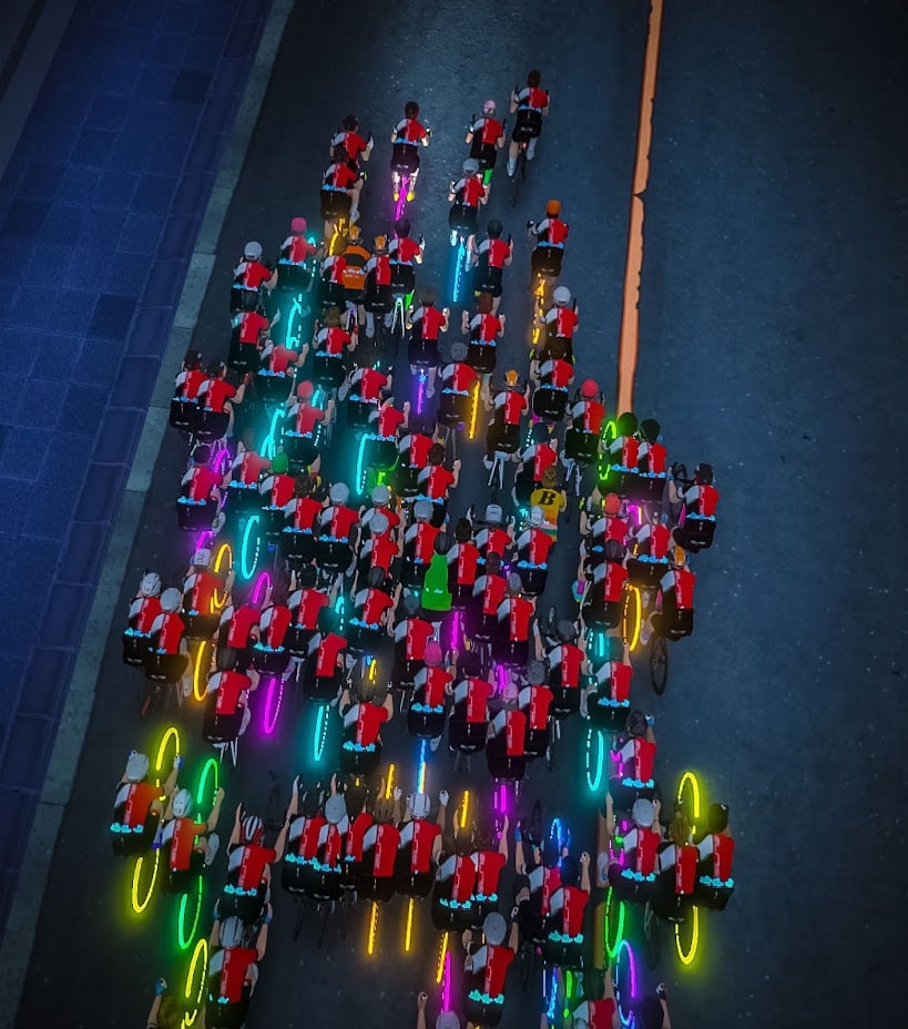 large group of Zwift cycling avatars from aerial view