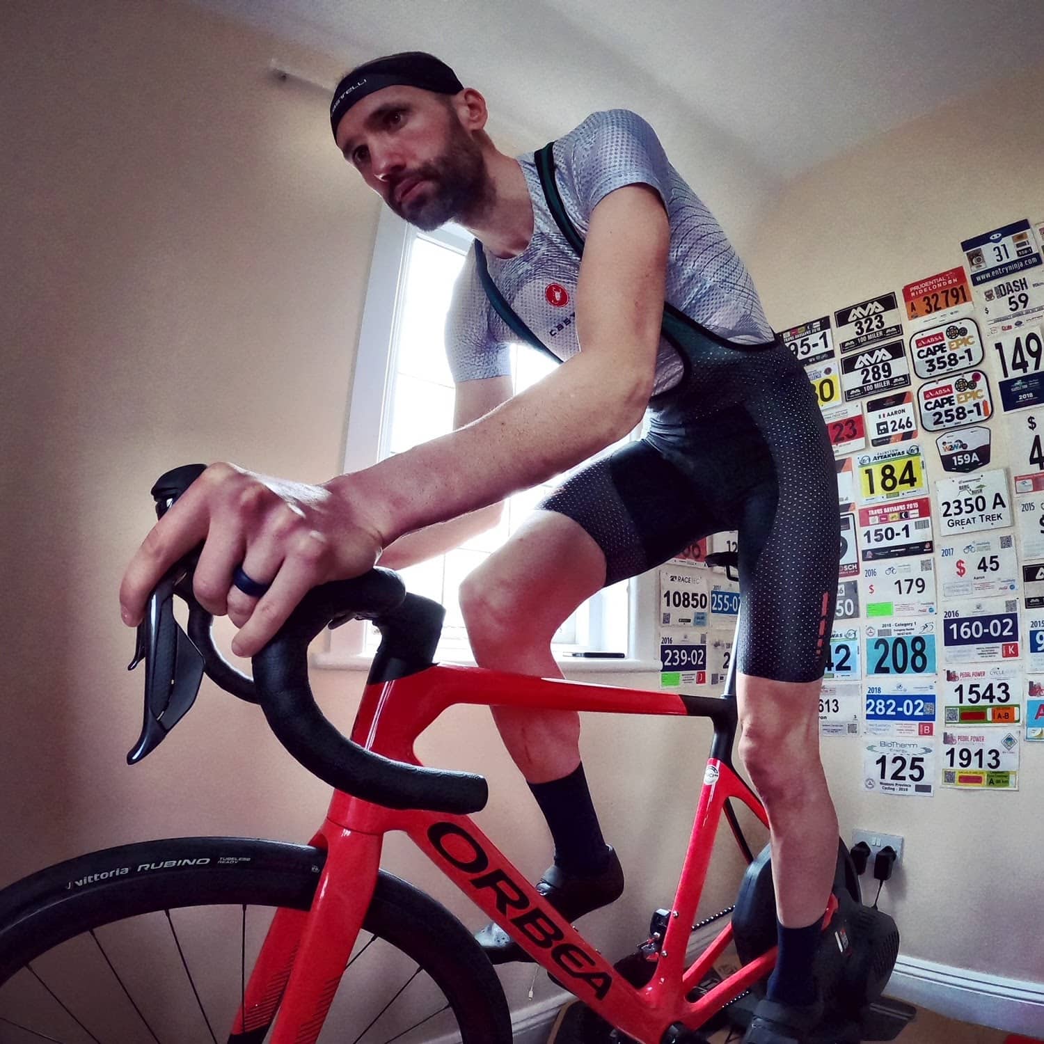 Aaron Borrill riding bike indoors
