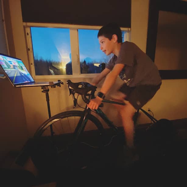 Noah McKenzie riding indoor bike