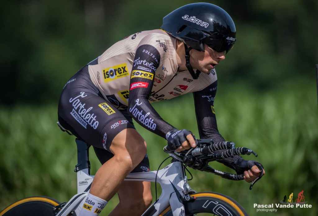 Lennert Teugels racing time trial bike with aero helmet