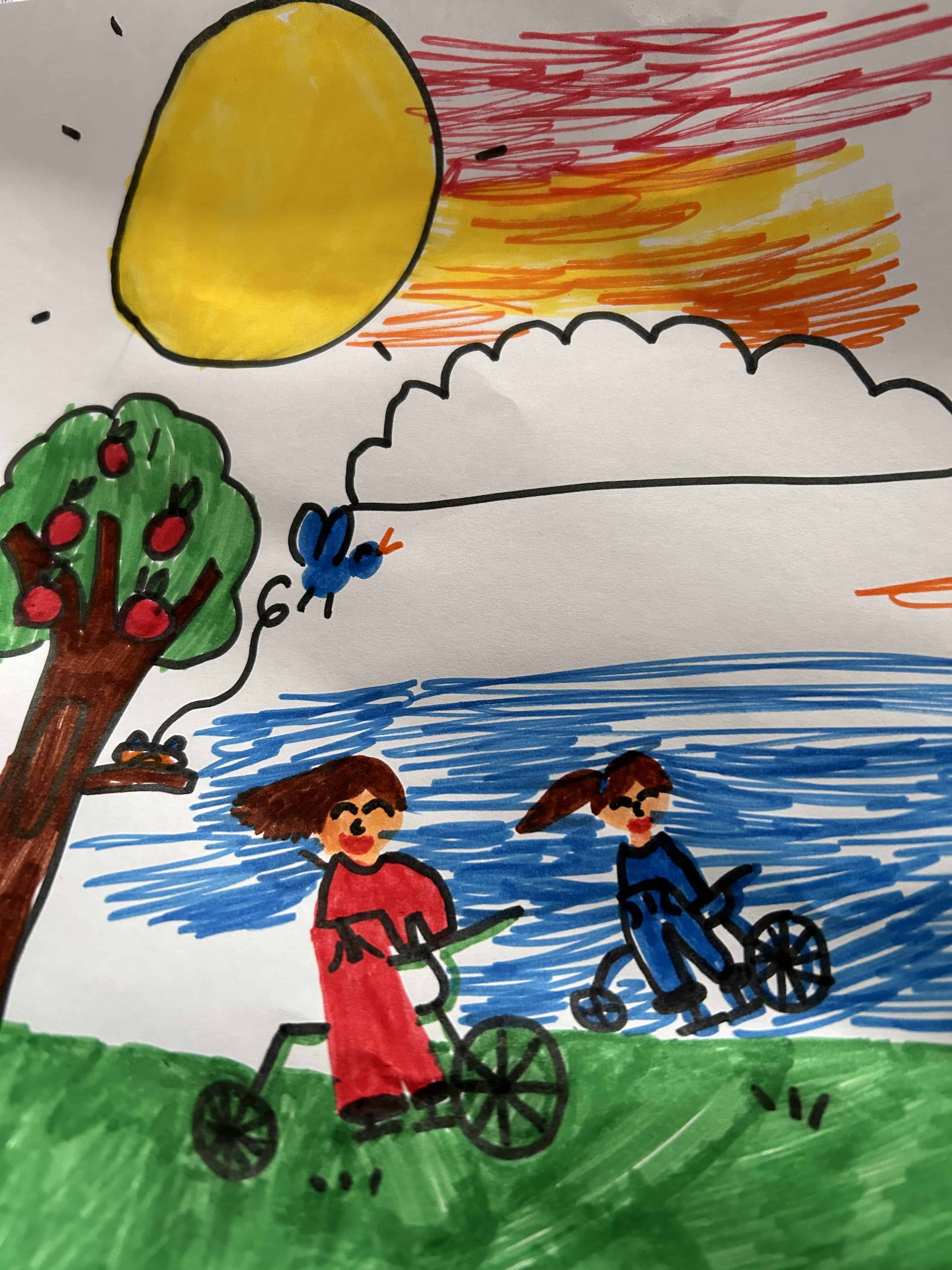 Childrens marker drawing of two people riding bikes