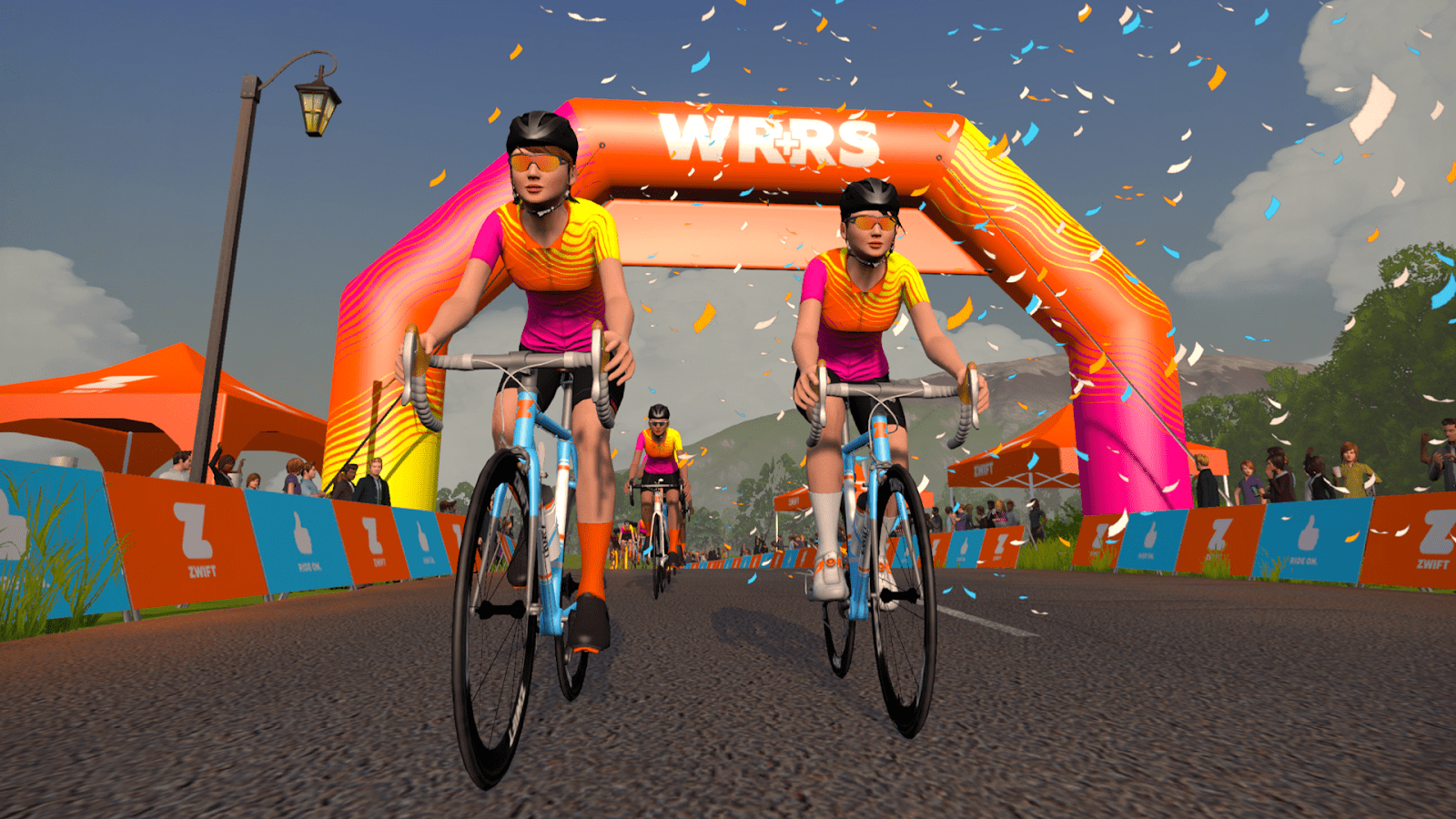 Zwift virtual cycling image of bikes riding under arch