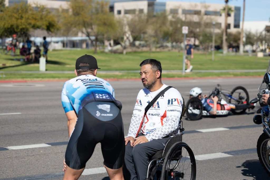 Project Echelon's Eric Hill talking to a wheelchair athlete