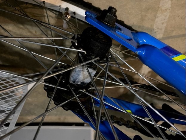 description of sensor taped on hub of a bike wheel forZwift for Children