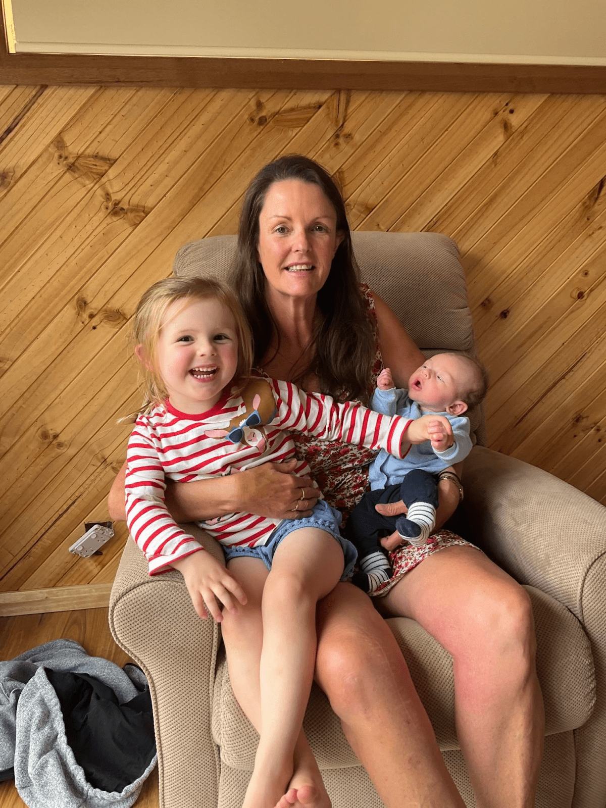 Sharron Yaxley holding her two grandchildren