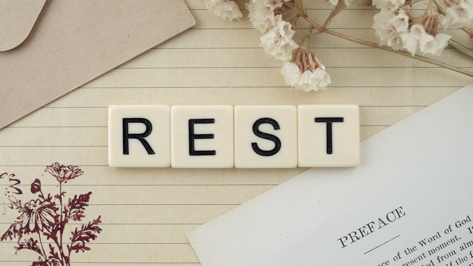 rest spelled out in scrabble tiles
